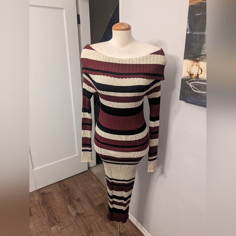 Off the shoulder body con striped dress.